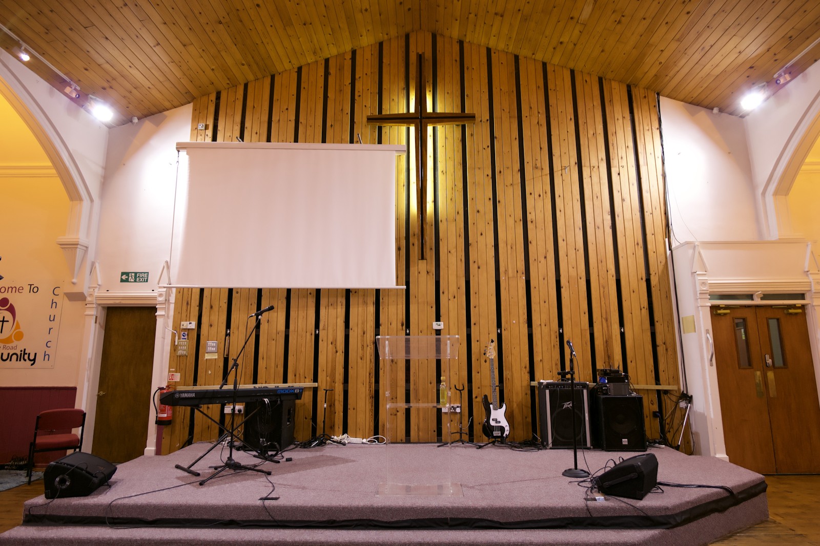 The stage and cross in the main hall